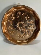 Large copper colored astrology zodiac wall hanging jello mold picture