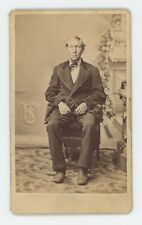 Antique CDV Circa 1870s Sad Looking Older Man Sitting in Chair Wearing Suit picture