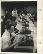 1964 Press Photo Election workers computing results as they come in - mjx88186 picture