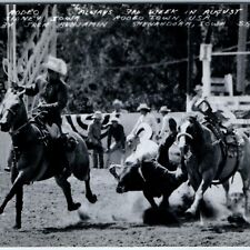 c1950s Sidney, IA RPPC Rodeo Town Cowboy Falling Bull Real Photo Shenandoah A245 picture