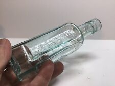Small Antique Aqua Granny’s Delicious Sauce Bottle. picture