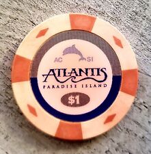 $1 Atlantis AC SI Paradise Island, Bahamas Casino Chip - orange/peach color RARE picture
