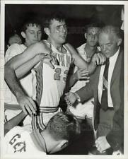 1967 Press Photo A Miami basketball player is treated for an injury - afx19864 picture