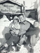 AgD) Found Photo Photograph Family Posing Santas Village Sign B&W Artistic Snow picture