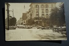 1910 flooded European town logs floating through streets real photo postcard picture