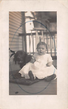 RPPC Baby Lydia on Porch With Her Black Dog Companion c1910 AZO Photo Postcard picture