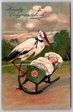 PFB Fantasy~Stork Rocks Baby In Cradle~Pacifier~Emboss~Serie 6289~c1910 Postcard picture