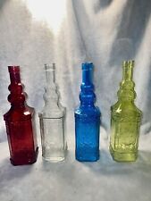 Fancy colored bottles 12 in , never used. 4 Bottles picture