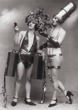 Two Chorus girls dressed up as perfume bottle and lipstick in the - Old Photo picture
