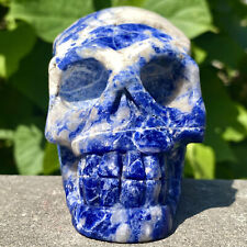 498G Natural Blue stripe quartz hand Carved skull crystal healing picture