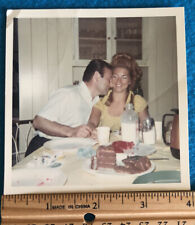 Vintage Color Photo Man Nuzzling Pretty Woman over Milk & Chocolate Cake picture