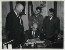 1964 Press Photo Euclid Mayor Kenneth Sims signs the proclamation of Scout Week picture