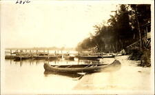 Houghton Lake~Prudenville Michigan MI~RPPC~canoes~pier~cabin~boats~Roscommon PM picture