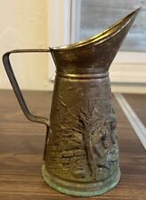 Vintage Brass Embossed Pitcher with People Sitting Around Table Scene picture