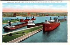 Sault St. Marie MI-Michigan, Freighters Wait To Enter The Locks Vintage Postcard picture