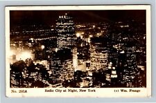 Night View Radio City, New York City NY, RPPC c1943 Vintage Postcard picture