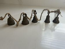 VINTAGE STRING OF 5 SOLID BRASS ETCHED BELLS VARIOUS SHAPES picture