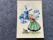 A little girl by a windmill Vintage Dutch Postcard picture