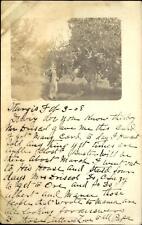 RPPC boy in orchard ~ Sturgis 1908 ~ real photo postcard ~ long message picture