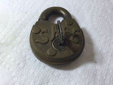 EARLY SMALL BRASS PADLOCK SAFE EMBEDED ON FACE COOD WORKING ORDER W KEY. picture