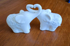 Set of White Elephant Salt & Pepper Shakers Intertwined Trunks into a Heart picture