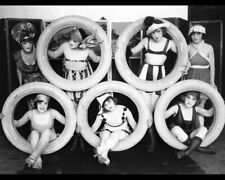 Print: Mack Sennett Girls In Costumes Posed With Tires, circa 1920-1932 picture