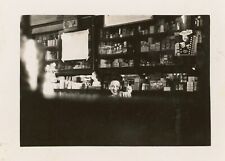 odd FUNNY abstract photo WOMAN hides behind STORE COUNTER occupational 1947 picture