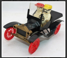 vintage plastic car salt and pepper shakers with people picture