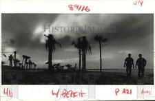 1985 Press Photo Lake Pontchartrain Beach - N.O. Levee Policemen walk on beach picture