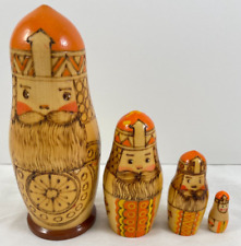 Nesting Dolls Orange Wooden Old Man Knight Hand Painted Set of 4 picture