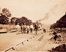 Men Working on Railroad Track with Train in Back Early 1900s Vintage Photograph picture