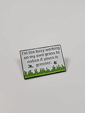 I'm too busy working on my own grass to notice if yours is greener.  Lapel Pin picture