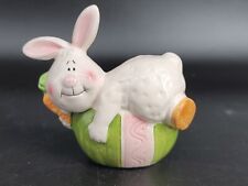 Bunny on Egg Porcelain Figurine Rabbit with Carrot On Green and Pink Easter Egg picture