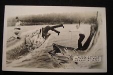 VTG MICHIGAN FISHING EXAGGERATION RPPC MAN RIDING NORTHERN PIKE GIANT FISH COMIC picture