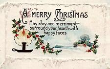 c1910 MERRY CHRISTMAS CANDLE HOLLY SNOW HOME SCENE EMBOSSED POSTCARD 20-108 picture