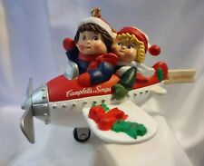 Campbell Kids Soup Christmas Ornament Kids In Airplane 1998 Happy Holidays picture