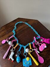 Vintage 80s Plastic Clip On Bell CHARM Necklace 9 Charms Sports Roller Skates picture