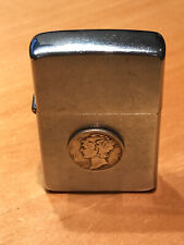 VINTAGE ZIPPO WITH A 1941 MERCURY SILVER DIME ATTACHED ON THE FRONT picture