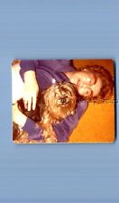 FOUND COLOR PHOTO L_6274 PRETTY WOMAN IN GLASSES LAYING ON FLOOR WITH DOG picture