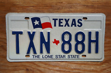 1990s TEXAS License Plate # TXN 88H - TEXAN picture