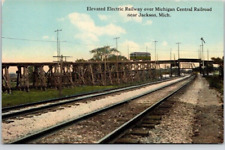 JACKSON, MICH. POSTCARD Elevated Electric Railway over Michigan Central Railroad picture