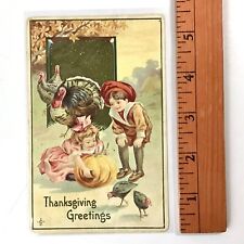 Antique THANKSGIVING Postcard - LSC 1911 - Boy Girl Pumpkin Embossed Unposted picture