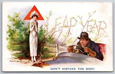 Fred Spurgin Leap Year~Lady “Yield” Sign~Man Hunkers in Car~Don't Mistake Sign picture