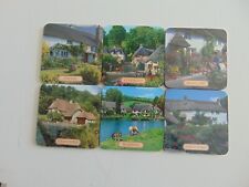 Coasters with motifs of old houses; Cockington, Croyde, and Devon Cottage, etc. picture