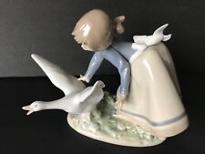 lladro. Girl chasing a duck. .  Excellent condition picture