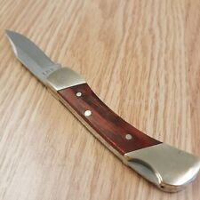 Schrade Uncle Henry Brown Bear Folding Knife Stainless Steel Blade Wood Handle picture