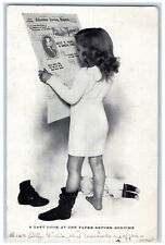 Little Girl A Last Look At The Paper Before Bedtime Doll Columbus OH Postcard picture