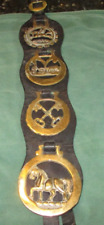 Four Vintage Horse Brass Medallions on  leather strap picture