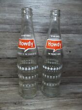2 Howdy soda bottles made by Seven -UP  Co.  bottle says 1967 picture