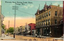 Wisconsin Str Showing Ember House Shops Bike Portage WI Divided Postcard c1910 picture